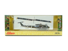Laden Sie das Bild in den Galerie-Viewer, Schuco 452653100, Bell UH-1H US Army, 1:87, neu, OVP