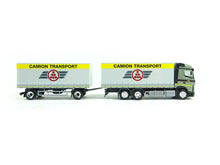 Laden Sie das Bild in den Galerie-Viewer, MB Actros `18 Streamspace 2.5 Koffer-Hängerzug "Camion"(CH), Herpa H0 950787 neu OVP