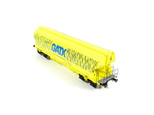 Laden Sie das Bild in den Galerie-Viewer, NME H0 Getreidewagen Tagnpps 95m³ GATX neongrün mit Getreideähren 525660 AC neu OVP
