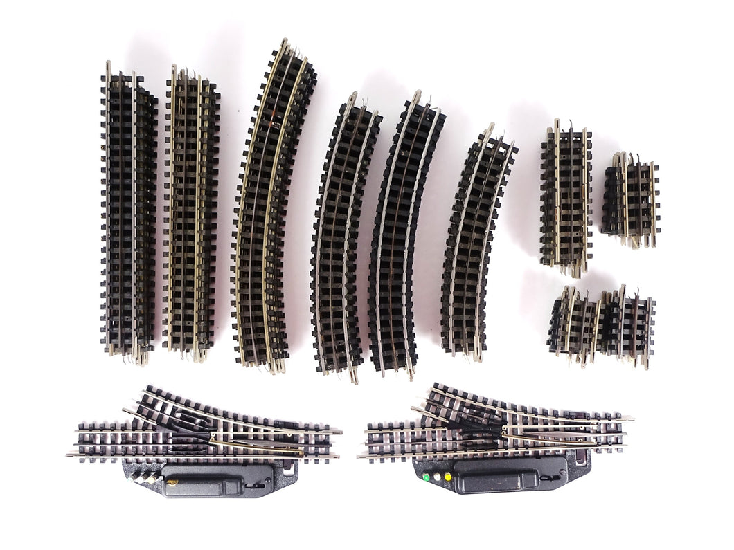 Trix Express H0 Gleise Konvolut 52-teilig gerade gebogen Weiche Trenngleis