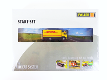 Laden Sie das Bild in den Galerie-Viewer, Modellbau Start Set Car System LKW DHL, Faller H0 161607 neu, OVP
