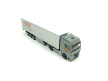 Laden Sie das Bild in den Galerie-Viewer, MAN TGX GX Gardinenplanen-Sattelzug &quot;KM Cargo&quot;, Herpa H0 952361 neu OVP

