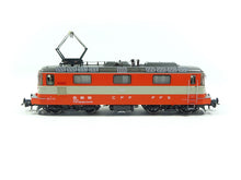 Laden Sie das Bild in den Galerie-Viewer, Elektrolokomotive Re 4/4 II 11108 „Swiss Express“, SBB sound digital, Roco H0 7510002 neu OVP
