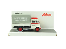 Laden Sie das Bild in den Galerie-Viewer, Modellauto MB L319 Pritsche/Plane MÄRKLIN SPRINT mhi, Schuco H0 45 267 1302 neu OVP
