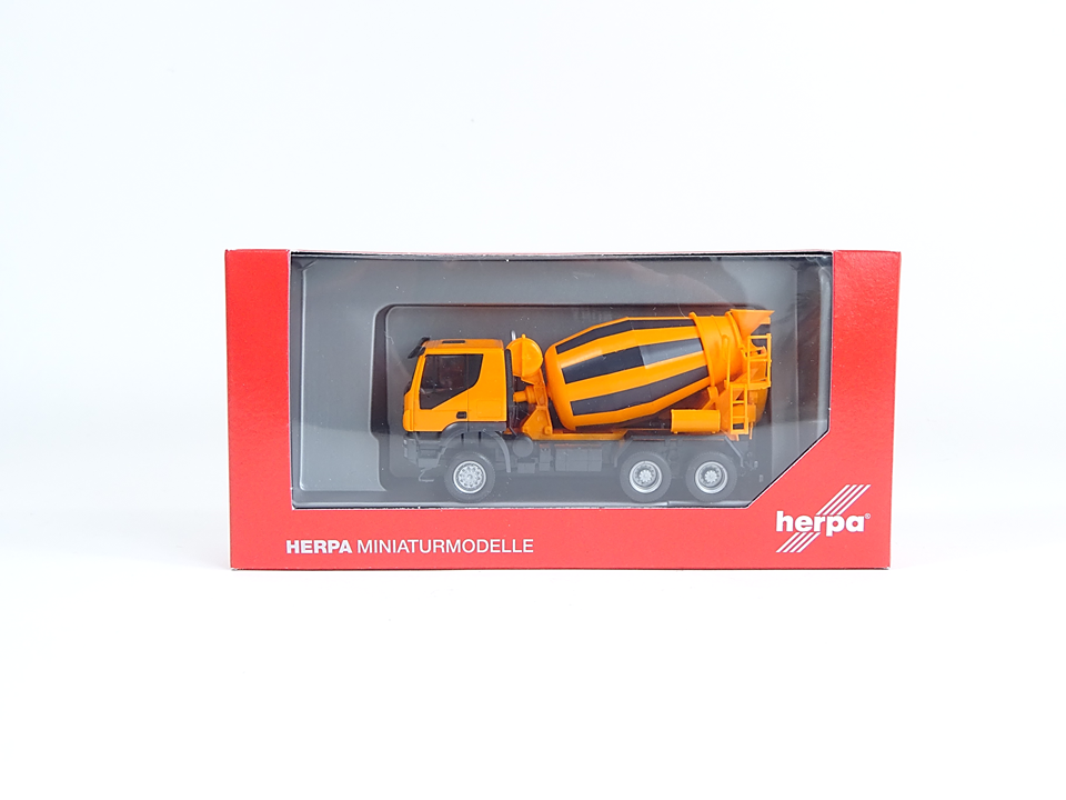 Herpa 310000, Iveco Trakker 6x6 Betonmischer-LKW, orange, 1:87, neu, OVP